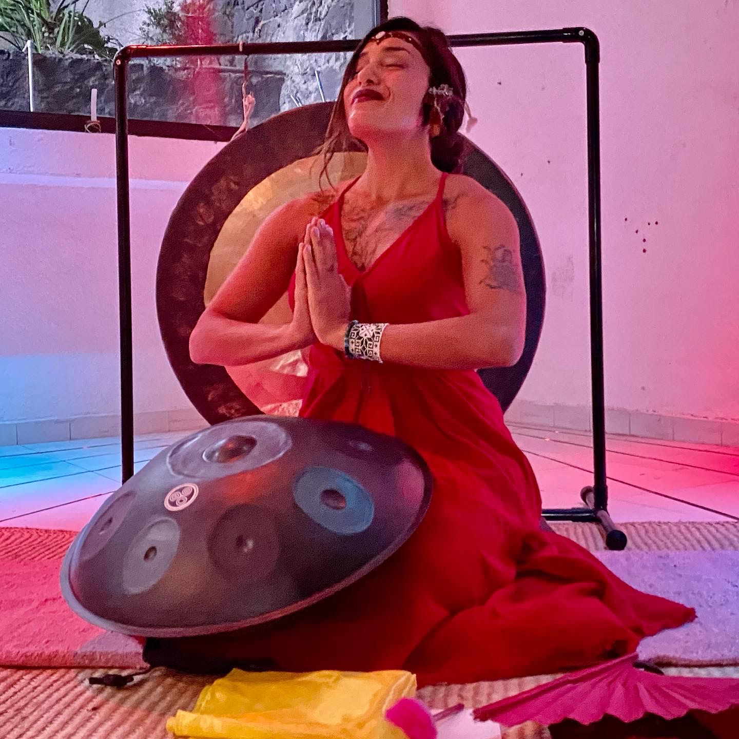 Dani meditating with handpan